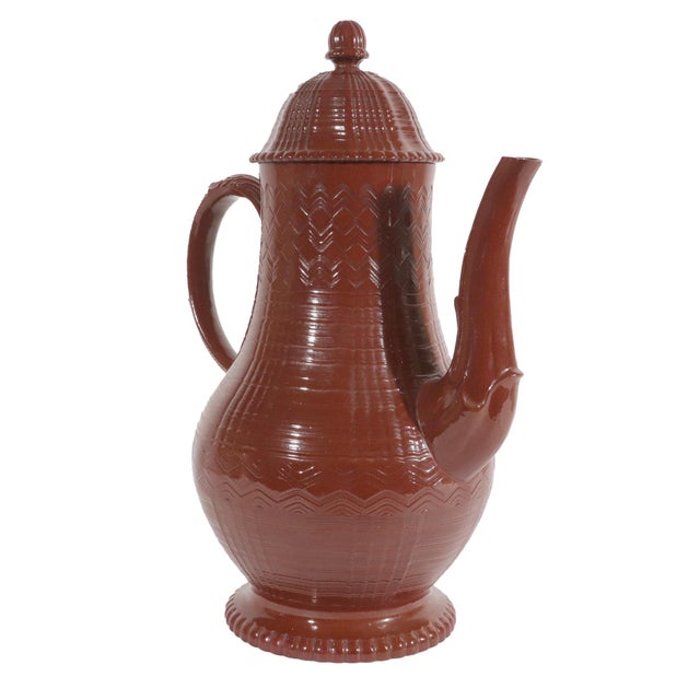 Engine-Turned Elegance: Staffordshire Redware Coffee Pot by Myatt, Circa 1790-1810 A substantial and finely crafted...