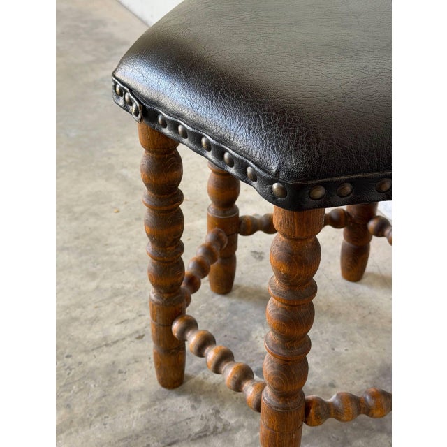 Mid-Century Modern Black Leather Oak Ottoman With Nailhead Trim Spindle Legs Vintage Mid-Century Modern 1970s For Sale - Image 3 of 10