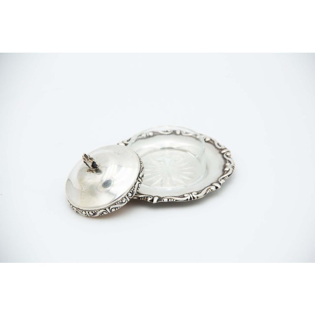 Embossed Silver Butter Dish with Glass Container, in Very Good conditions. Designed 1920 to 1949 This piece has an...