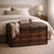 (30" H x 23.5" D x 43.5" W) This impressive antique dome-top wooden trunk is a richly textured example of late 19th-...