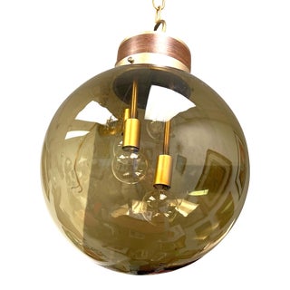 1970’s 4 Light Smoked Glass Globe Pendant For Sale