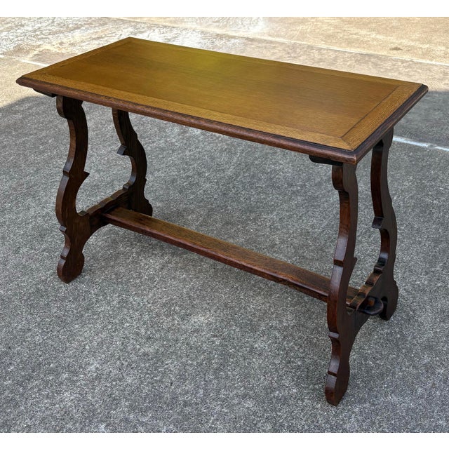 Nice vintage Spanish revival trestle console table. Nice lines!