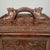 A complete traveling mahjong set housed in a hand-carved wood case, likely made in China for export during the early 20th-...