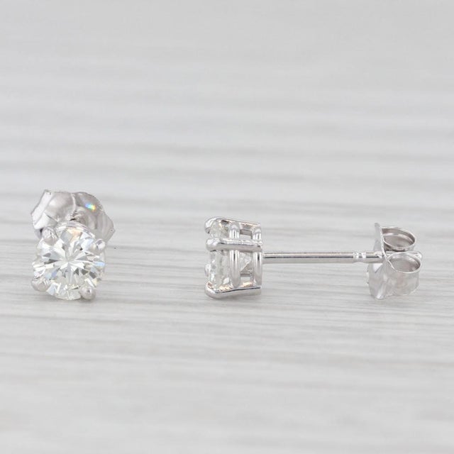 Gemstone Information: - Natural Diamonds - Total Carats - 0.47ctw Cut - Round Brilliant Color - H - I Clarity - VS2 - SI2...
