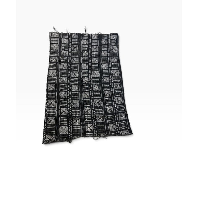 Vintage hand weaving from 100% cotton, this authentic mud-cloth textile is made by the skilled artisans of the Bamana...