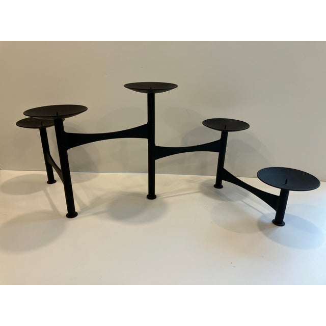 This iron expandable candle holder holder when fully expanded is 28 inches The candle cups are 4.5 inches wide The heights...
