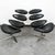 Pair of black leather and chrome Corona chairs with matching ottoman. Unique and high-quality pieces. Unmarked examples....