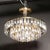 Mid-Century 3-Tier Faceted & Cut Crystal Chandelier in Brass W/ Glass Rod Detail For Sale - Image 10 of 18