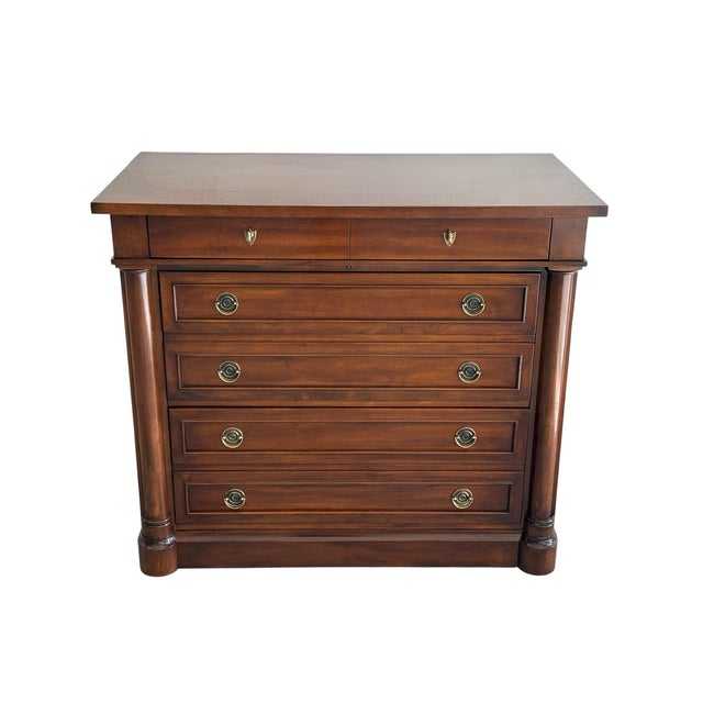 This refined Sligh storage chest features classic architectural lines and column detailing that give the piece a timeless,...