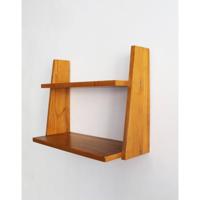 An original mid-century wall shelf believed to have been designed and produced in former Czechoslovakia during the 1960s....