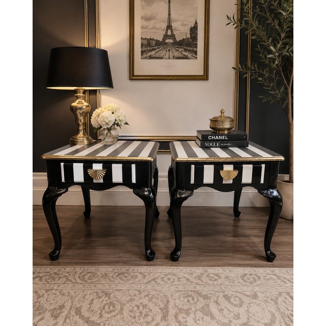 One-of-a-kind matching side tables, hand-refinished from the ground up. Crisp painted stripes with delicate gold leaf...