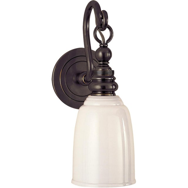 Boston Loop Arm Sconce in Bronze with White Glass Designer: Chapman & Myers Height: 12.5" Extension: 7.5" Backplate: 4.75"...