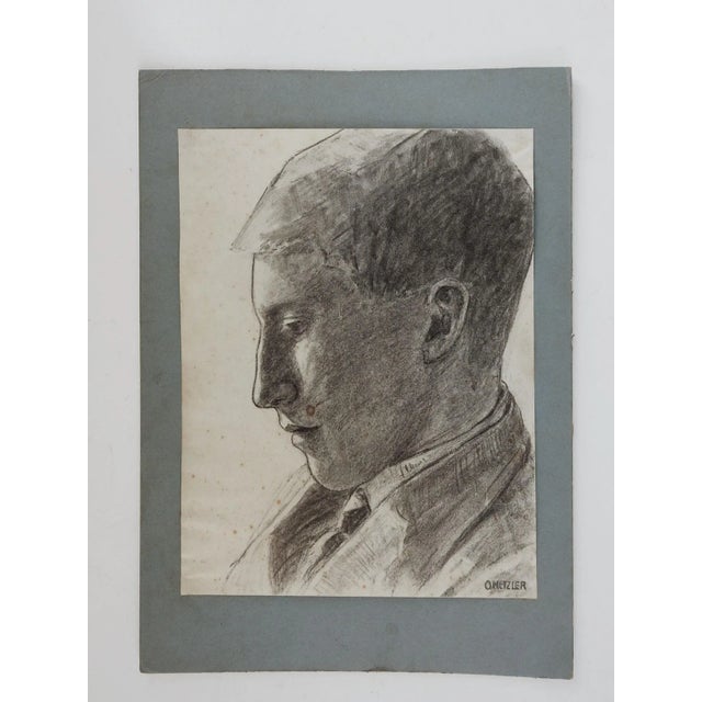 Vintage pencil on paper drawing of young man. Signed O. Metzler lower right corner. Mounted on gray mat board backing,...