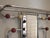 This coat stand was made and manufactured in France in the 1940/50s. It is made from chromed steel with six red and yellow...