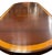 An impressive late 19th century English mahogany extension dining table featuring an elegant elongated oval form and rich...