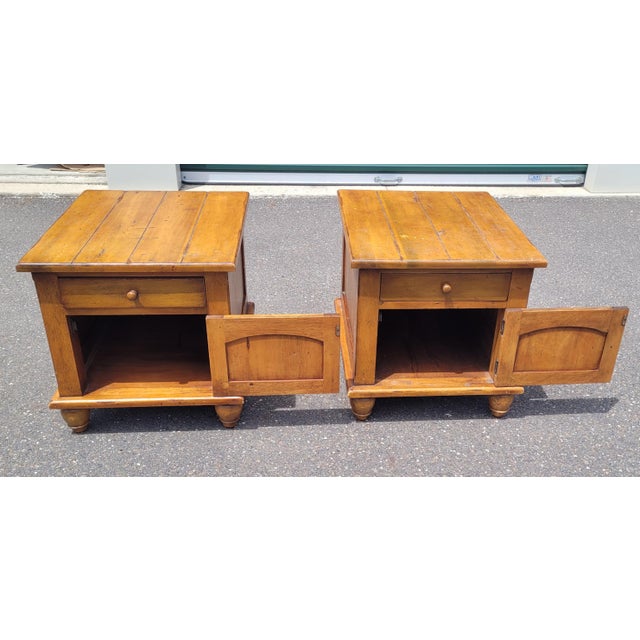 Vintage pair of 1970s rustic cabin distressed pine end tables or nightstands. Each measures 26 in Deep by 22 in wide by 23...