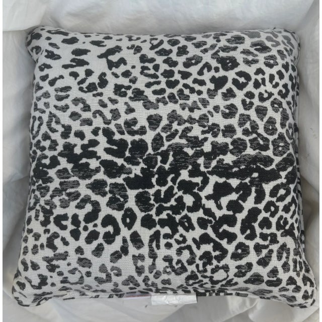 Go wild! Add a little exotic touch to your favorite outdoor (or indoor) spot with this fabulous snow leopard pillow...