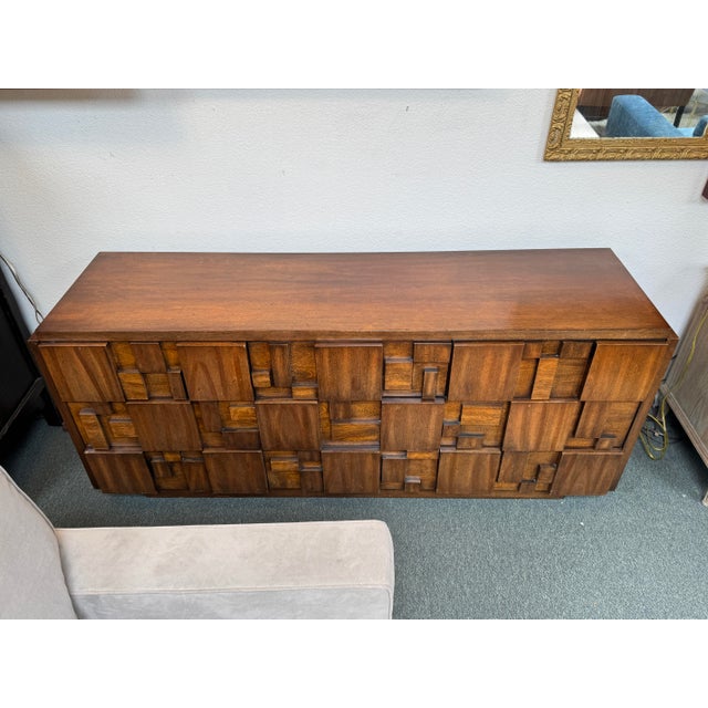 Design Plus Gallery presents the Staccato Brutalist Dresser by Lane Furniture from the 1970's. The Staccato line has the...