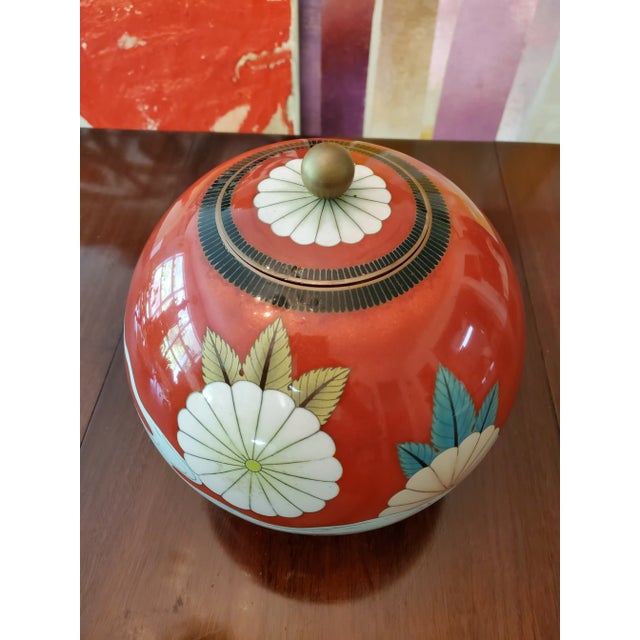 A very fine large art nouveau red antique Chinese cloisonne center piece. Having mastery in execution all made with...