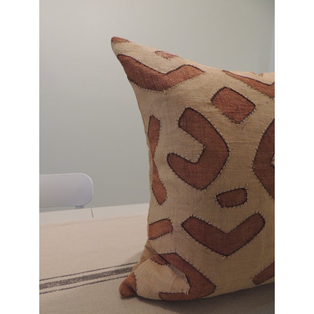 Vintage Square African Kuba Square Decorative Pillow. With golden silk backing. Size: 20" x 20" By: Antique Textiles...
