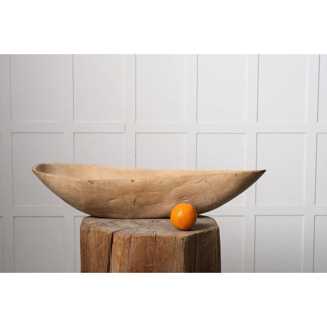 Unique Swedish folk-art bowl in a very unusual boat like shape. This wooden bowl is large and wide with date “1782”...