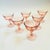 A set of 6 vintage coupe glasses in a pale blush pink hue. Each glass has a lovely swirl design. Made in France by...