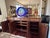 Custom 92-inch solid walnut sideboard made by Master Cabinetmaker. The piece was finished in 2020, installed as stage...