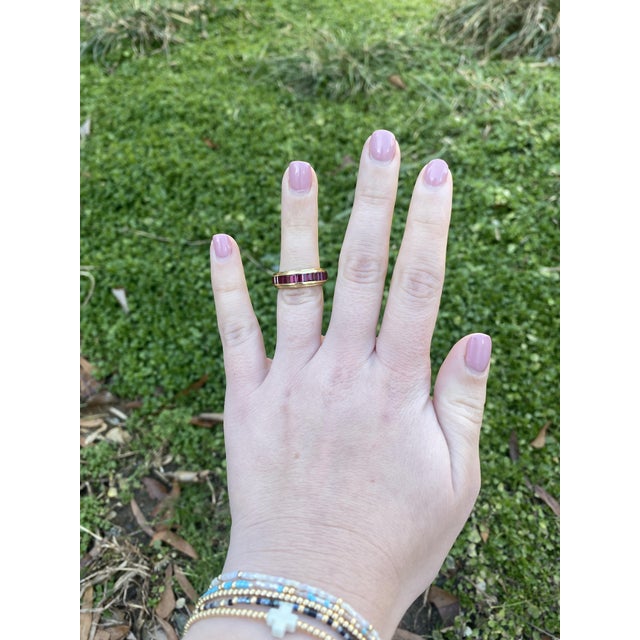 Stones: - rubies, 16 stones - baguette cut - 2.75 x 1.5 - 3.25 x 2 mm - approximately 1.68 total carats Ring Size 5.25...