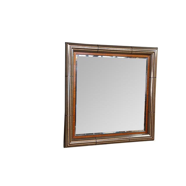 This large contemporary wall mirror features a bold, multi-layered square frame displaying exceptional marquetry and high-...