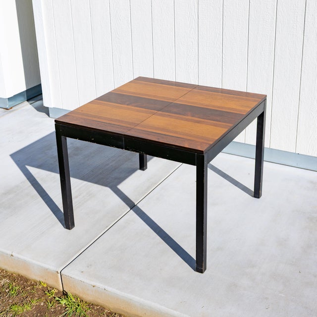 A rare "apartment-scale" masterpiece by Milo Baughman for Directional, this Model 28 A dining table is a study in Mid-...