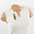 An exquisite metal brooch hand-crafted by the highly talented American artist Sharon Seggi, elegantly showcases the...