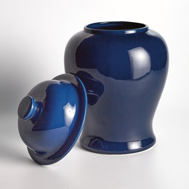 With a deep navy high gloss glaze, this lidded ginger jar is steeped in tradition. A perfect complement to the blue...