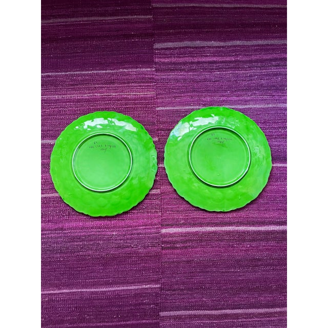 This pair of bright green plates are in the form of an open flower or artichoke. They were made in Italy in 1965 for Lord...