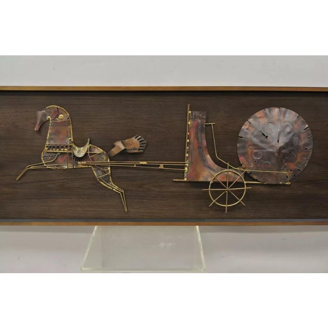 Vintage Mid Century Modern Gilt Metal Brutalist Horse & Chariot Wall Art by Hillside Original. Item features a wood frame,...
