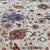 Persian Ziegler design hand-knotted rug featuring a luminous ivory field with a gracefully scattered all-over composition...