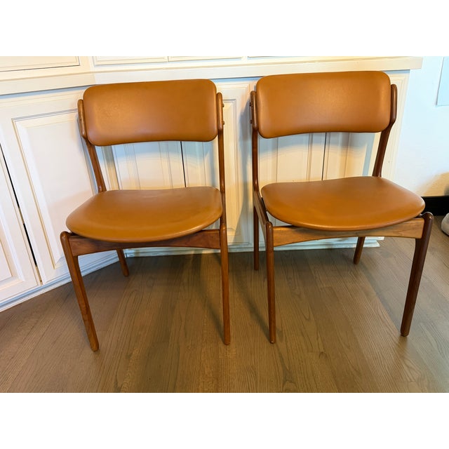 Genuine ID Mobler, mid-century modern Danish camel colored leather dining chairs series A-S, model 49, designed by Erik...