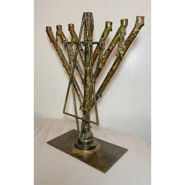 This vintage handmade brutalist 7 branch menorah is a unique piece of Jewish Judaica art. The menorah is beautifully...