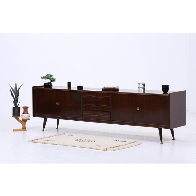Wonderful vintage high-gloss sideboard with drawers & compartments FEATURES * High-quality workmanship * Material: Wood *...