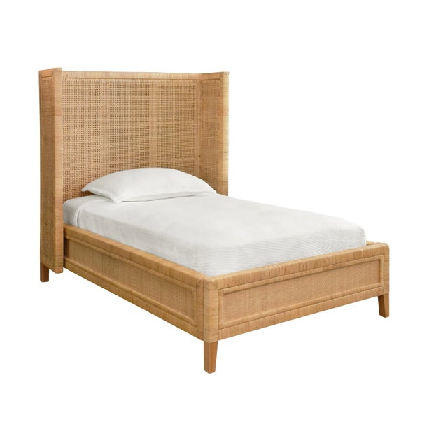 New Item, Introducing the Dolly Headboard - a winged headboard and platform, crafted from radio weave wrapped rattan. This...