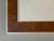 A luxurious rectangular wall mirror, post-modernist, shabby-chic, with a frame decorated with a glowing leather loupe...