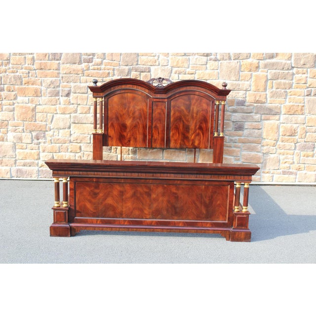 The Nine Elms Collection by Drexel Heritage featured this stately king-size bed with fluted columns on both the headboard...