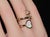 Authentic Chopard Happy Hearts Double Wrap Twist Ring in 18k Rose Gold With Mother of Pearl & Floating Diamond, Size 6.5 For Sale - Image 14 of 16