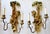 Pair of antique polychrome hand-carved wood and iron monkey wall sconces from the early 20th century. The multicolor...