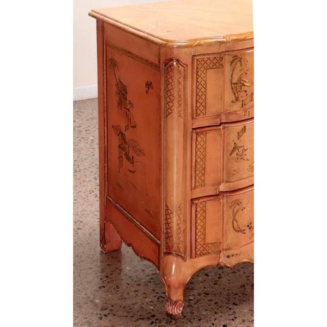 This is a 1950s French style Louis XV chest by Jacques Bodart. It has hand painted chinoiserie scenes and faux marble top...