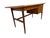A beautifully refinished Mid-Century Modern Drexel Declaration walnut writing desk, showcasing the clean lines and refined...