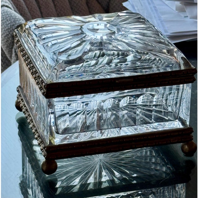 At 8+ pound, this heavy jewelry box is a beauty. Intricate cut patterns and heavy metal mount. It is something worth...