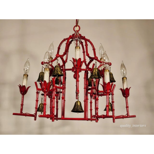Antique Faux Bamboo Pagoda Hollywood Regency 9 Light Birdcage Chandelier With Brass Bells This exquisite chandelier exudes...