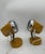 A pair of 1970s-style adjustable space-age table lamps, featuring a conical body in orange lacquered metal and a polished...