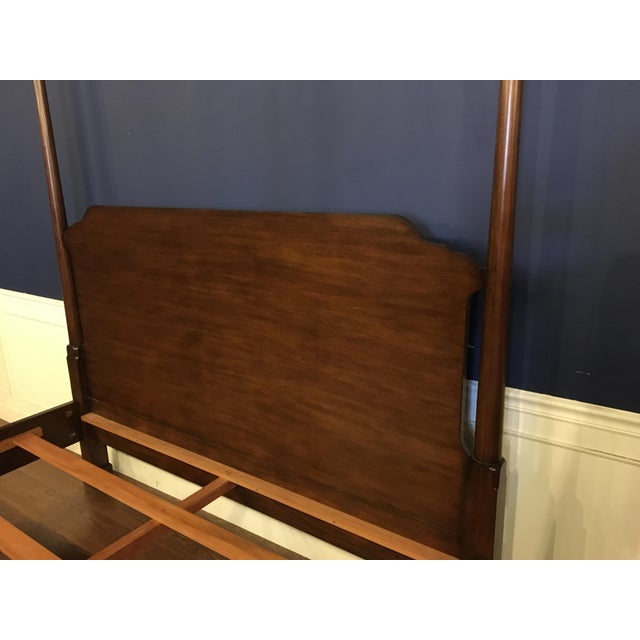 This is a traditional mahogany king size Pencil Post bed by Leighton Hall. It features classic clean lines with round...