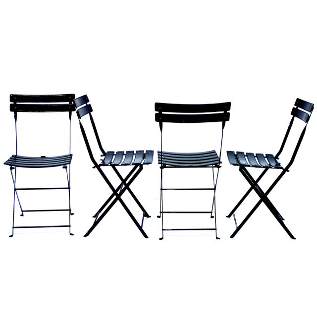 Set of four foldable Celestina chairs designed by renowned designer Marco Zanuso for Zanotta in 1978. Frame of black...